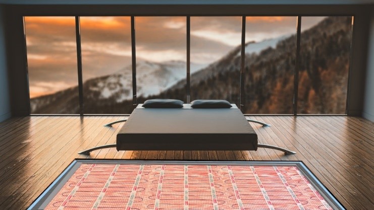 Fußbodenheizung StickyMat unter Holzboden im Schlafzimmer